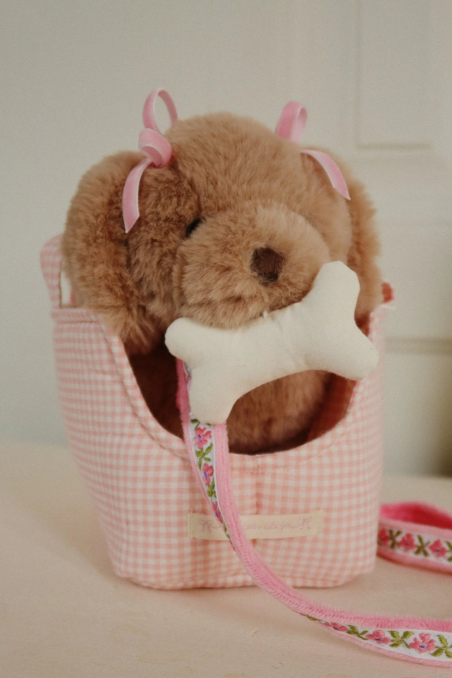 Welpe Maude - pink check