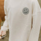 UNISEX OVERSIZED SWEATSHIRT 'PEACE BEGINS WITH A SMILE'
