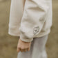 UNISEX OVERSIZED SWEATSHIRT 'PEACE BEGINS WITH A SMILE'