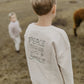 UNISEX OVERSIZED SWEATSHIRT 'PEACE BEGINS WITH A SMILE'